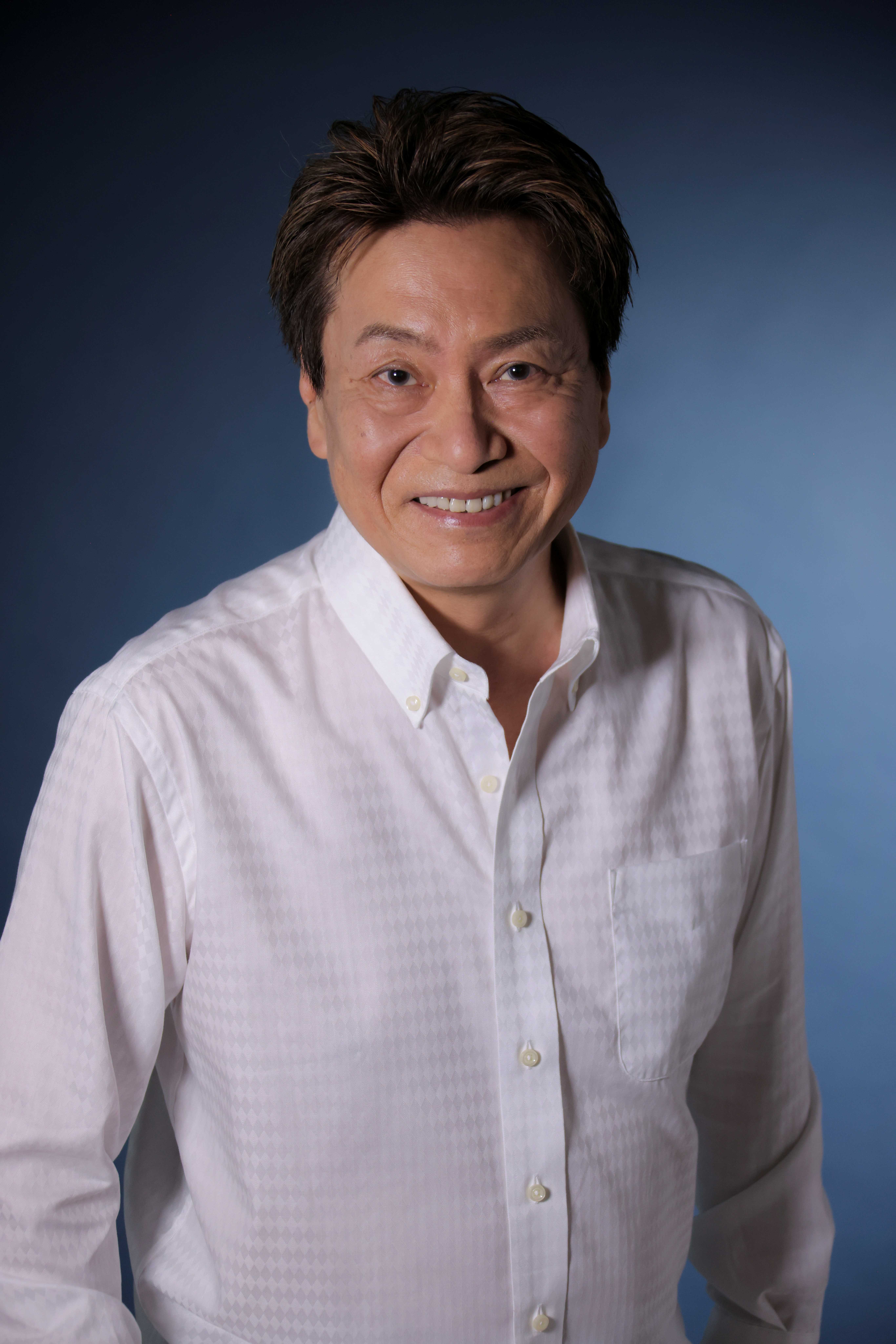 a photograph of Hirata Hiroaki smiling at the camera