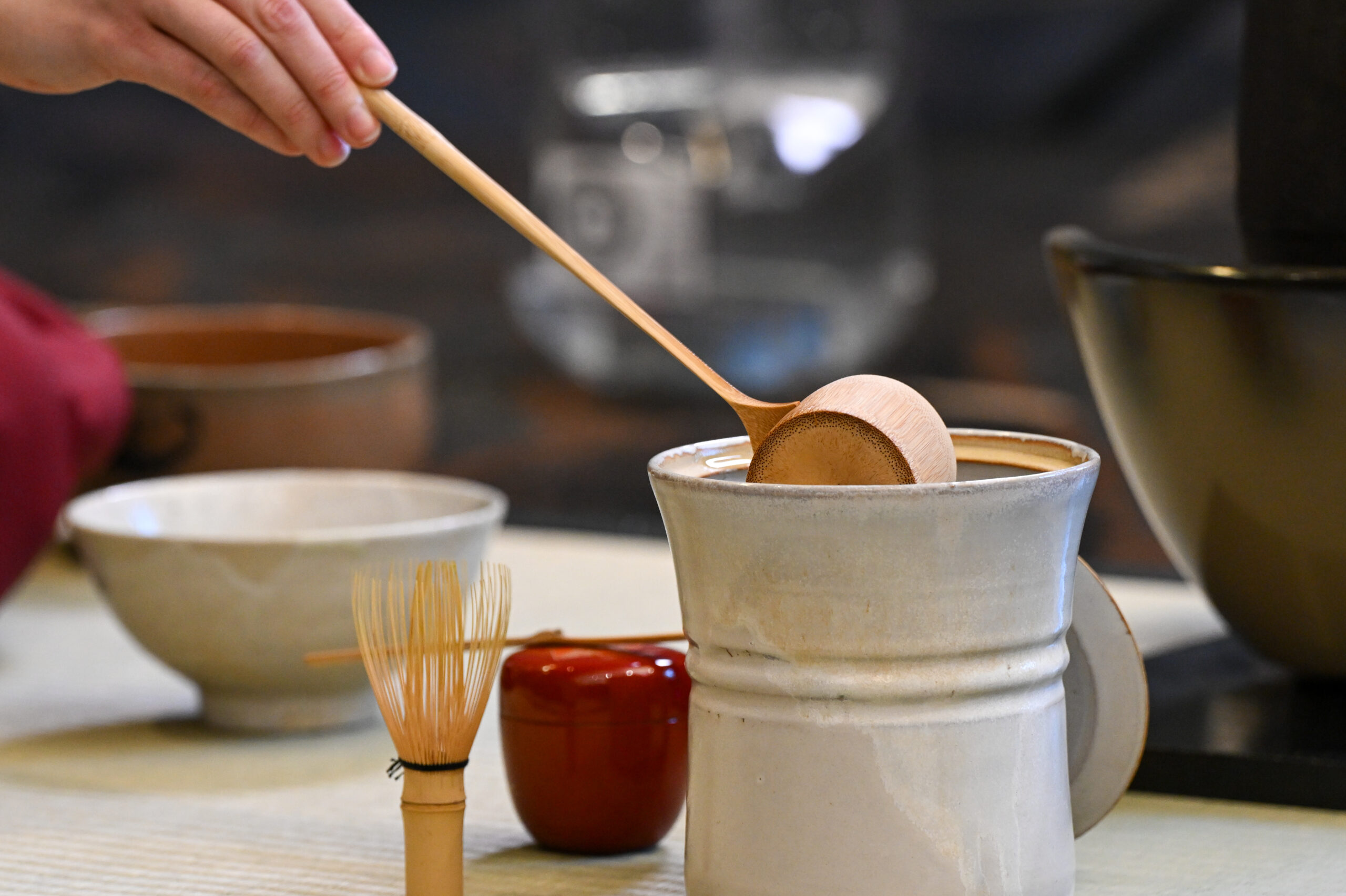 various tea ceremony tools on a mat